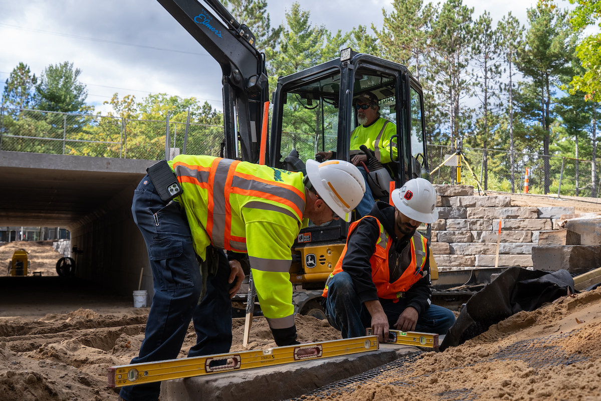 Team Elmer’s crew constructs a box culvert pedestrian tunnel to provide safe access under J. Maddy Parkway in Grand Traverse County.