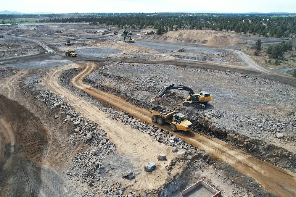 On the Redmond Wetlands Complex project, rock excavation prepares the engineered wetlands area for final grading, dike construction, and development of the wetland cells. (Photo courtesy of Taylor Northwest)