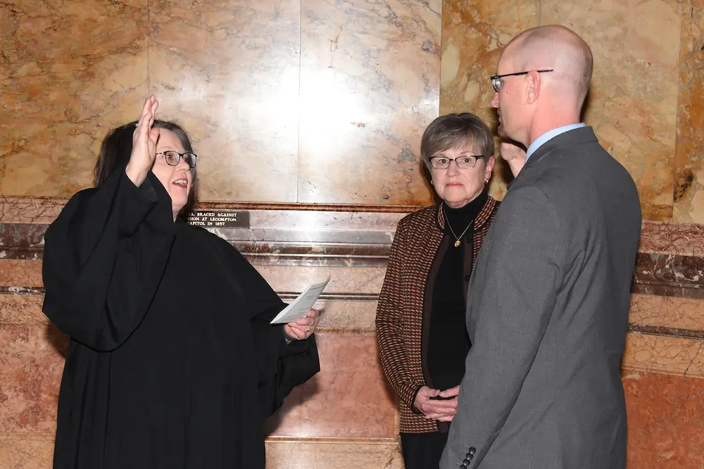 Following his confirmation by the Kansas Legislature, Reed is officially sworn in as the Secretary of Transportation, formalizing his leadership of the agency.