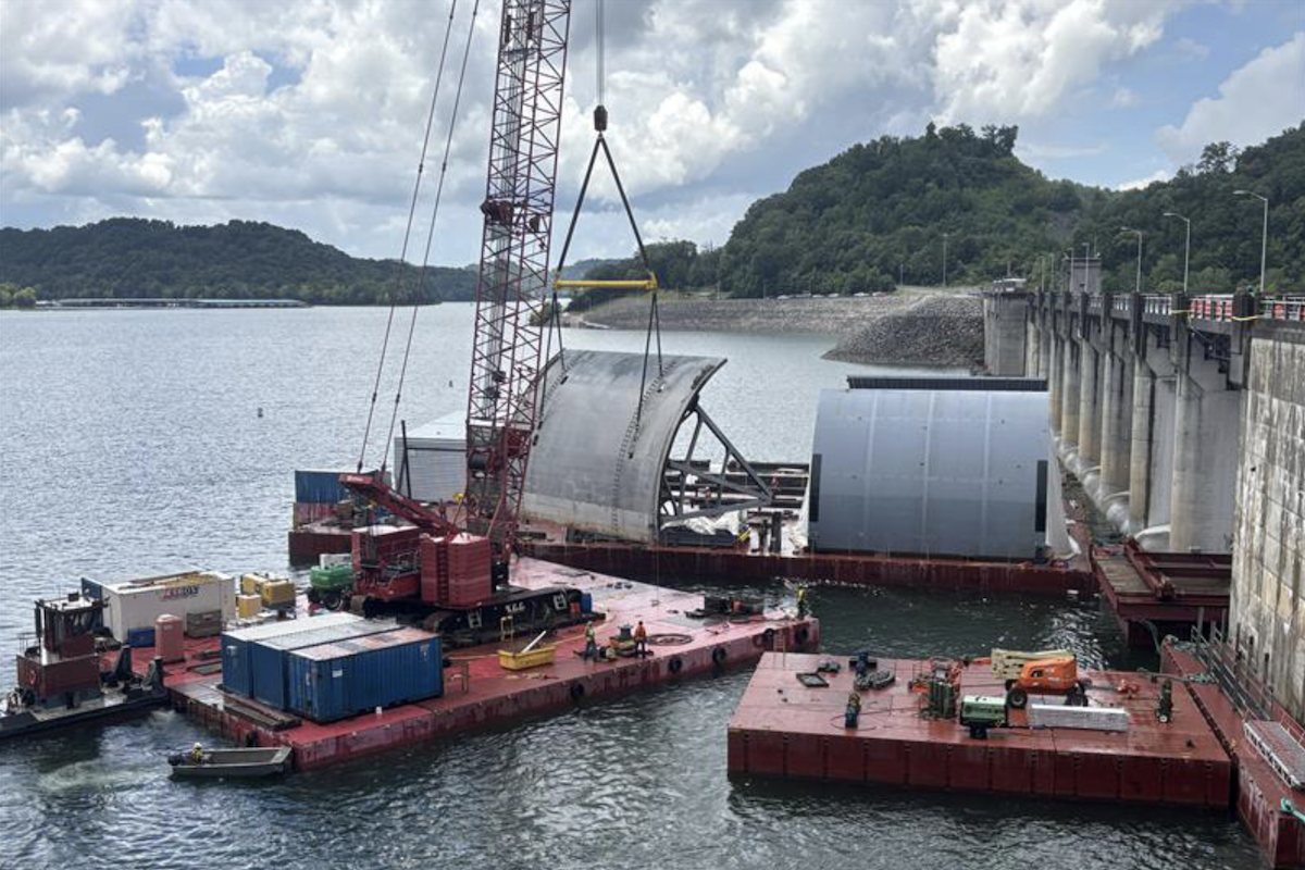 Work crews successfully remove the first massive spillway gate from Center Hill Dam. (USACE photo courtesy of Mike Freeman)