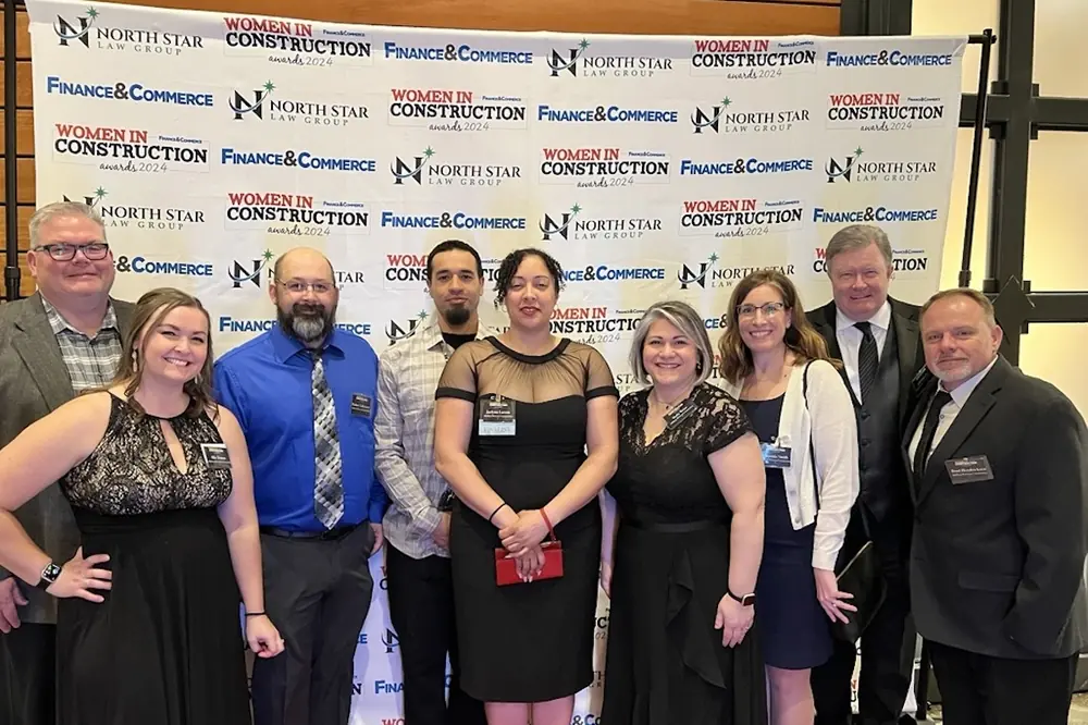 AP team members celebrating Jaelynn Larson, who was nominated by her peers for Top Women in Construction.