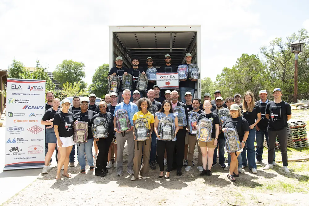 More than 100 volunteers put together 2,000 backpacks for children in need at TACA's Annual Meeting.