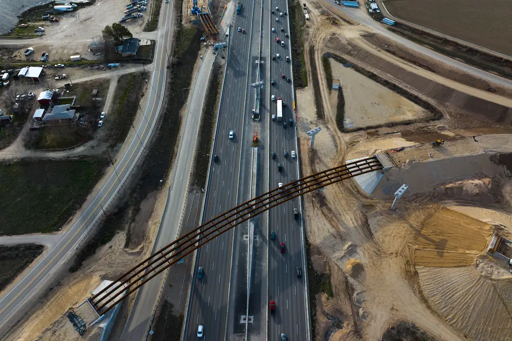 The I-84 system interchange will feature a three-level structure with substantial steel girder bridges.