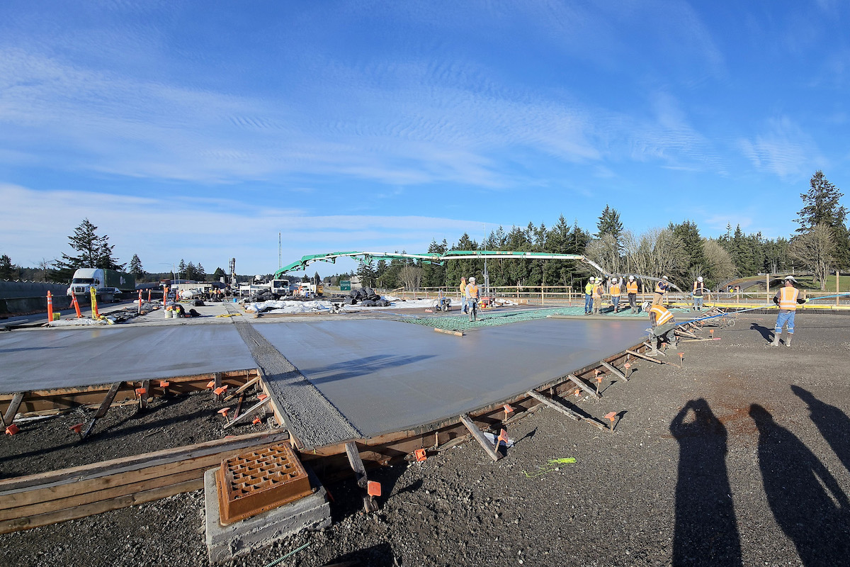 Crews pour the concrete surface of Pendleton Avenue Bridge.