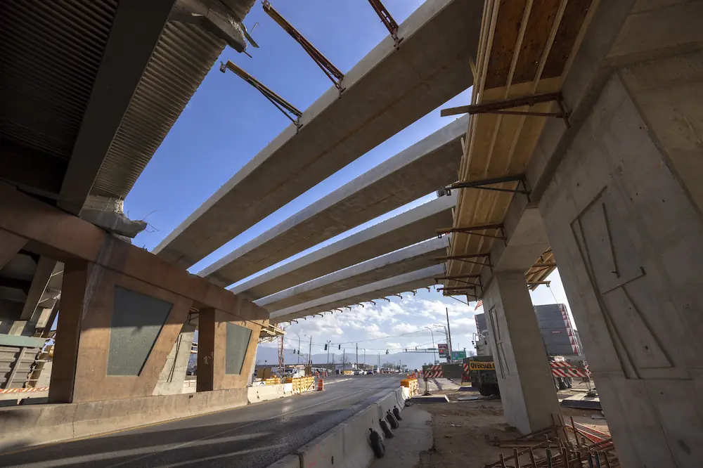 Shown here is a view from the underpass on Comanche Road, under I-25, looking east.