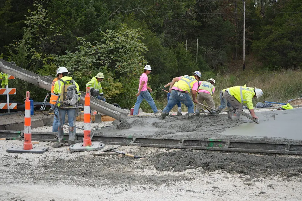 KCI concrete crews pour new road portions along Highway 67.