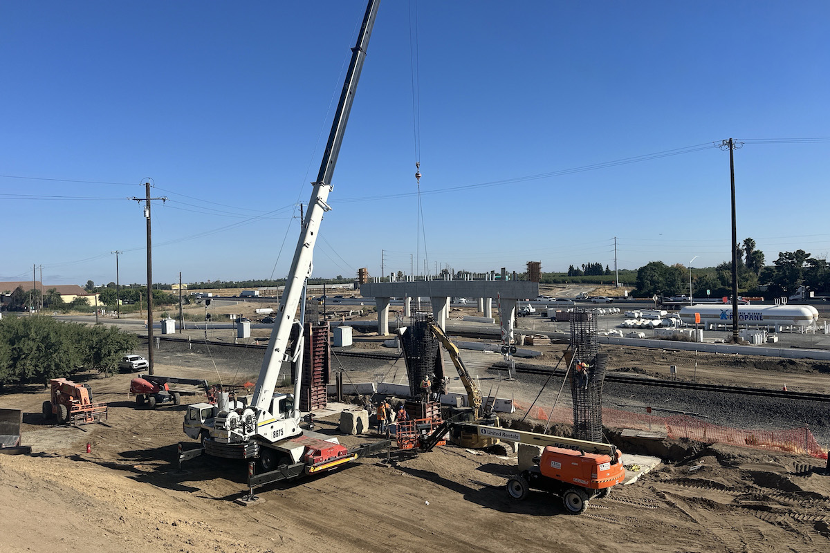 Work crews make progress on preparing supports for the bridge on State Route 99 and Union Pacific Railroad tracks.
