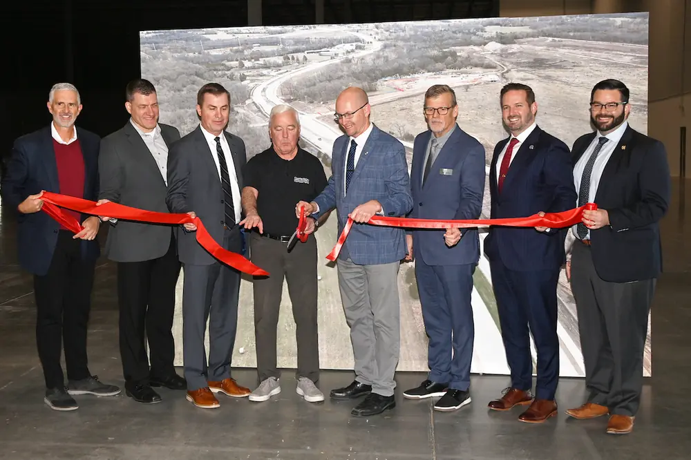 Reed celebrates the completion of the DeSoto Local Road Improvement project. This expansion of West 103rd Street supports the new Panasonic EV battery facility with a four-lane concrete roadway and enhanced pedestrian infrastructure.