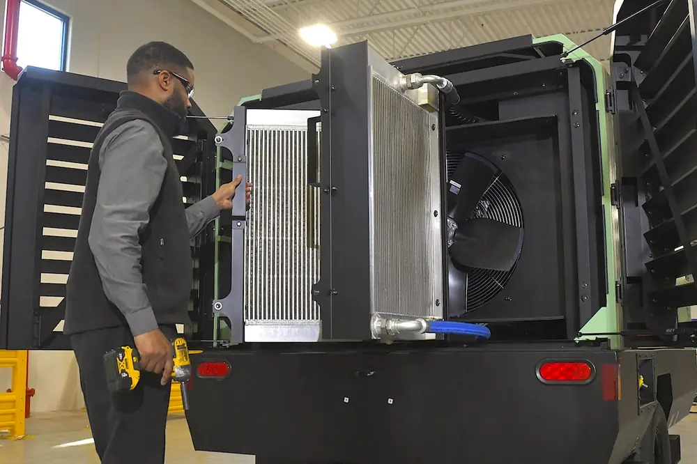 Swing out coolers on the Sullair E425H electric portable air compressor allow for quick and easy cleaning.