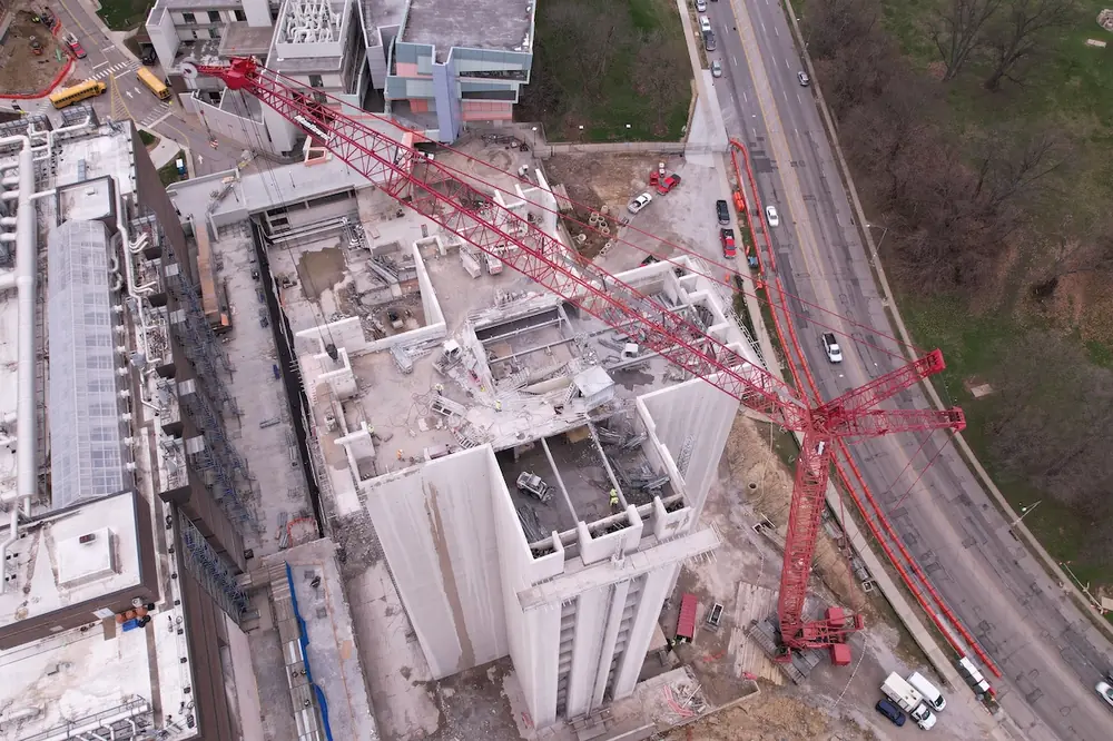 Cranes were used to lift concrete sections clear of the structure and lower them into staging areas for processing and recycling. (Photo courtesy of O’Rourke)