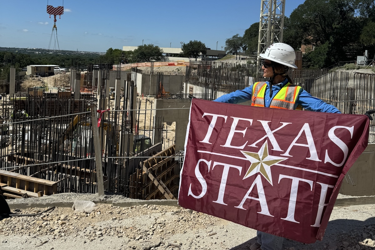 One of Skanska’s interns, Naz Ahmadi, onsite at the firm’s Texas State University project, where she attends college.