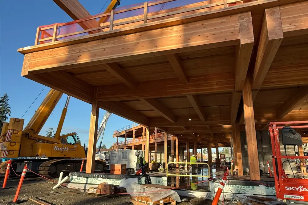 The building features glulam wood columns and beams and cross-laminated timber decking.