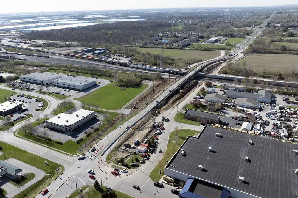 Superior Construction is widening a 200-foot-long bridge while maintaining traffic and coordinating work over an active rail yard in Avon, Indiana.