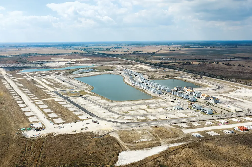 An aerial view shows the scale of the Lakefront development, where B&B Site Development Inc. is building roads, utilities, lakes, and house pads for a growing South Florida community.