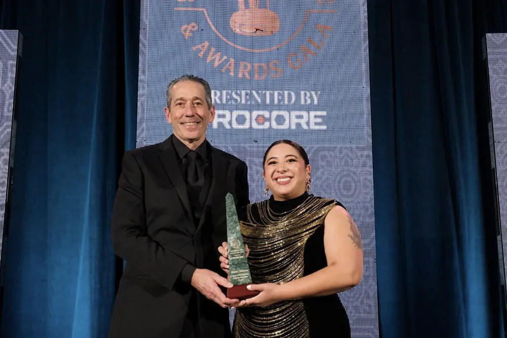 Bianca Johnson accepts the Construction Education Friend Achievement Award.