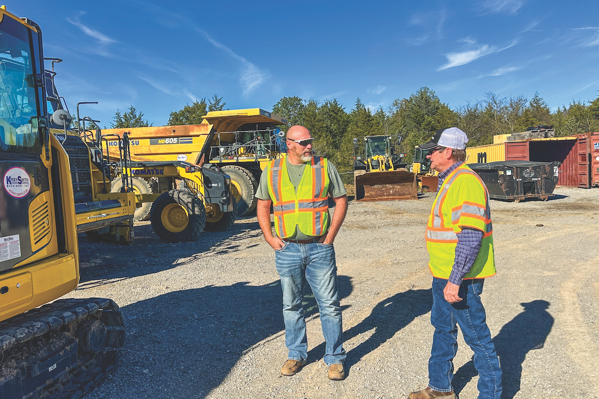 Lonehickory Cattle Owner Wes Collins (left) and KSM Territory Manager Ron Allen discuss equipment at KSM’s yard in McAlester, Oklahoma.