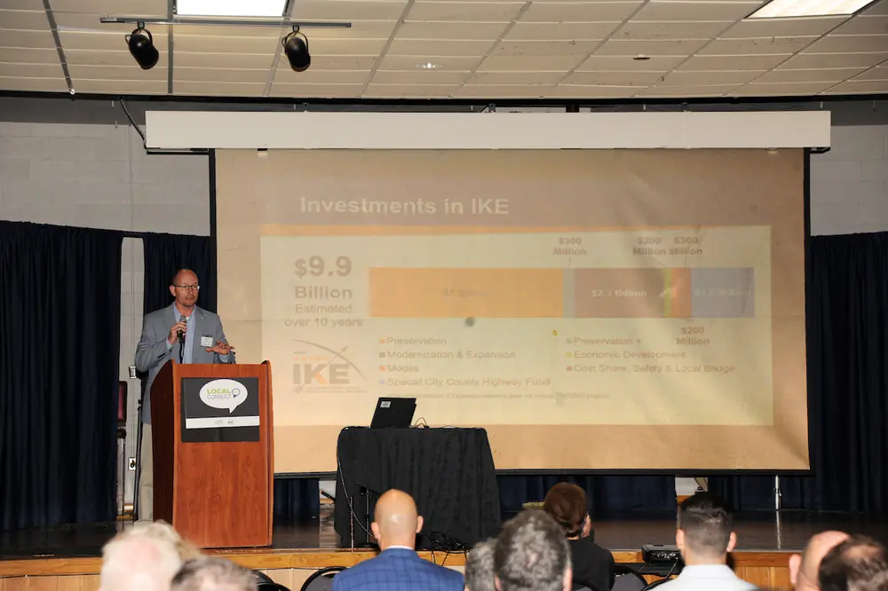 Reed addresses attendees at a stop of the 2025 Local Consult series. Held biennially across eight locations, these meetings facilitate vital regional dialogue on Kansas transportation needs.