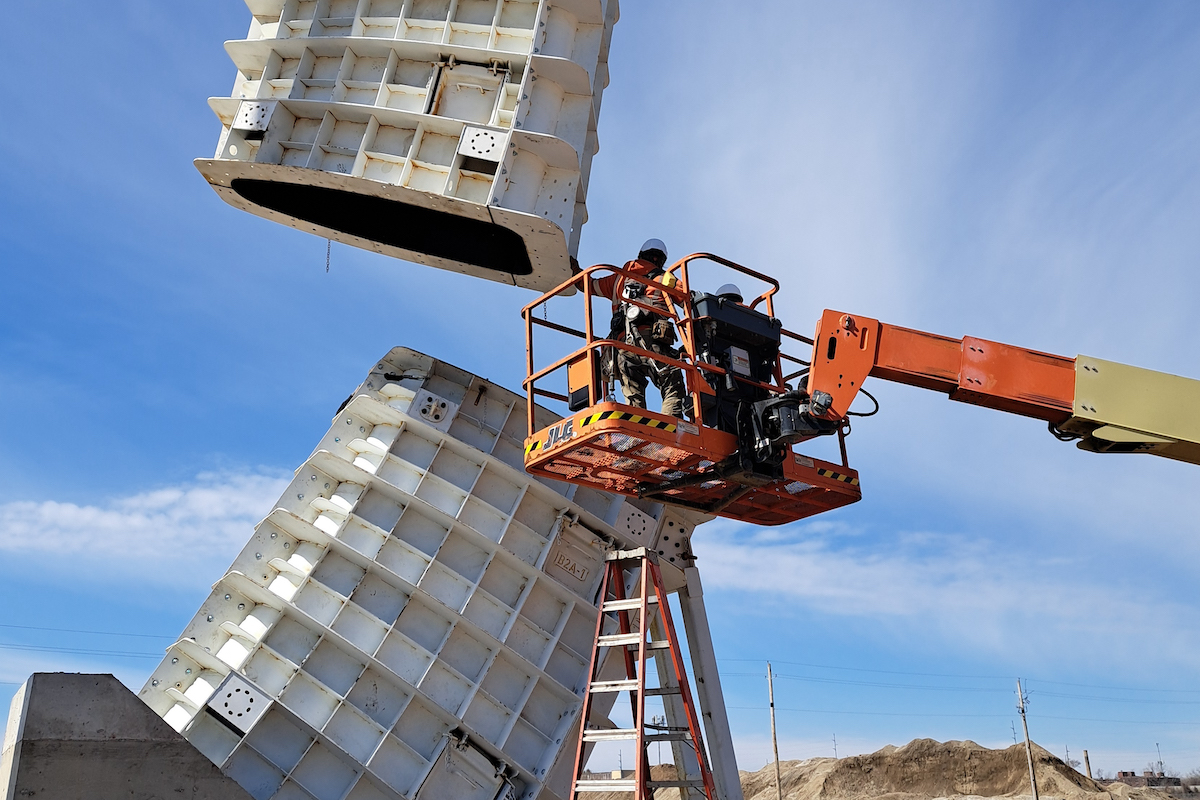 Each ring of the Henry Street Bridge is composed of 17 custom steel-formed pieces weighing 9,200 pounds each.