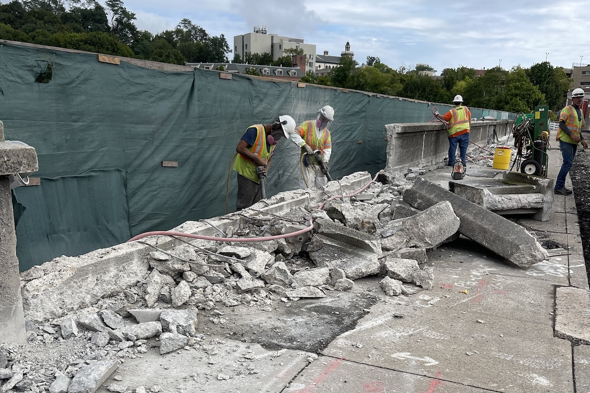 Crews replaced deteriorating parapet walls with new concrete walls that replicate the original, historic style.