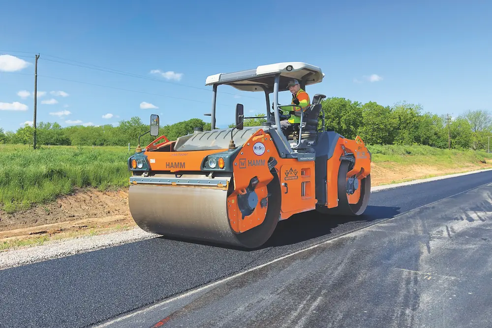 A Hamm HD+ 140i high-frequency, double-drum roller is used for compaction on Highway 19 between Stratford and Ada, Oklahoma.