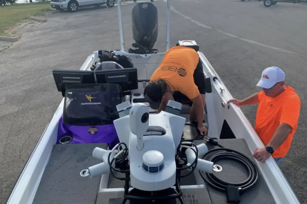 Boat-mounted LiDAR was deployed from a pontoon boat to capture substructure data beneath the bridges.