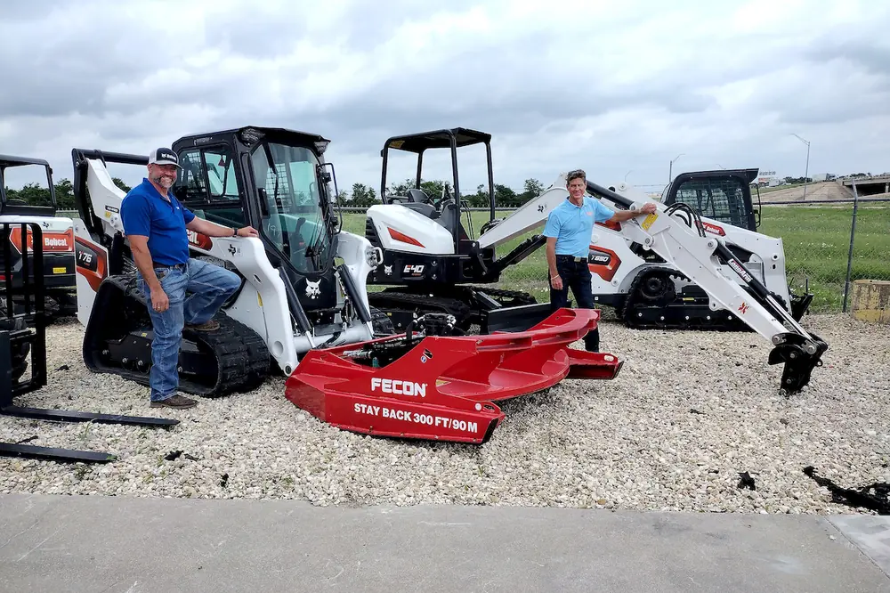 Inside Sales Representative John Weinberger and Outside Sales Representative Brad Caldwell pose with the equipment.