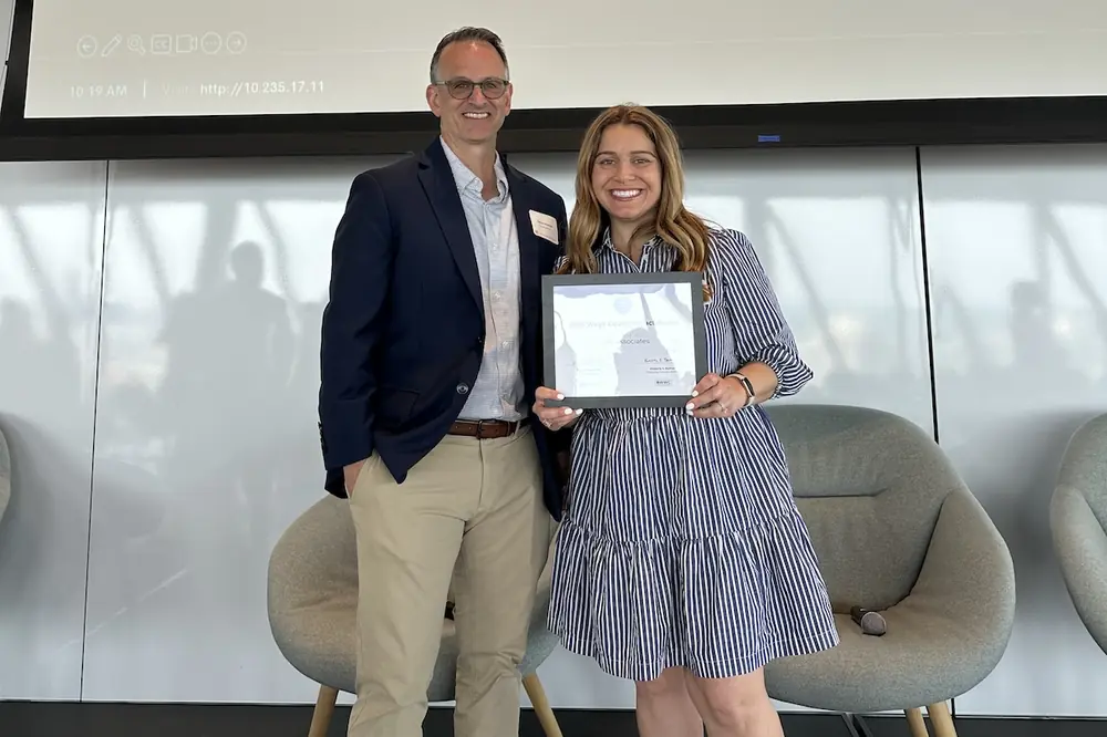 Gale Associates’ Managing Principal Steve Marshall and Director of Human Resources Lynette Young accept the 2026 Wage Equity Impact Award.
