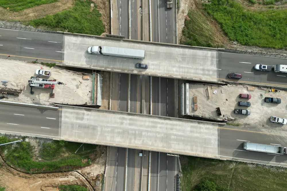 An aerial view shows bridge reconstruction along I-55.