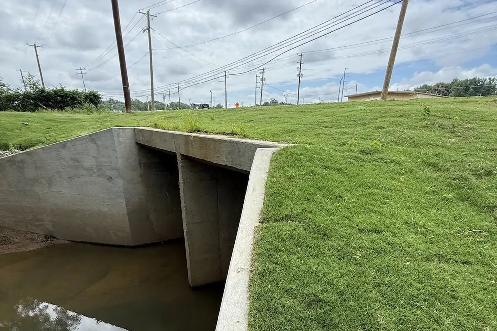 A box culvert extension goes under Shelby Drive at John’s Creek.