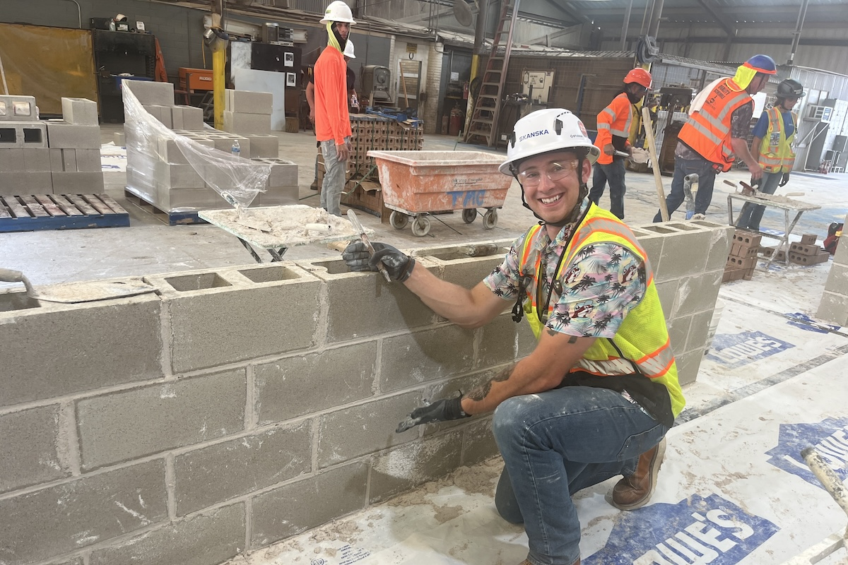 Chevelle Garcia, Project Engineer, learned how to lay brick.