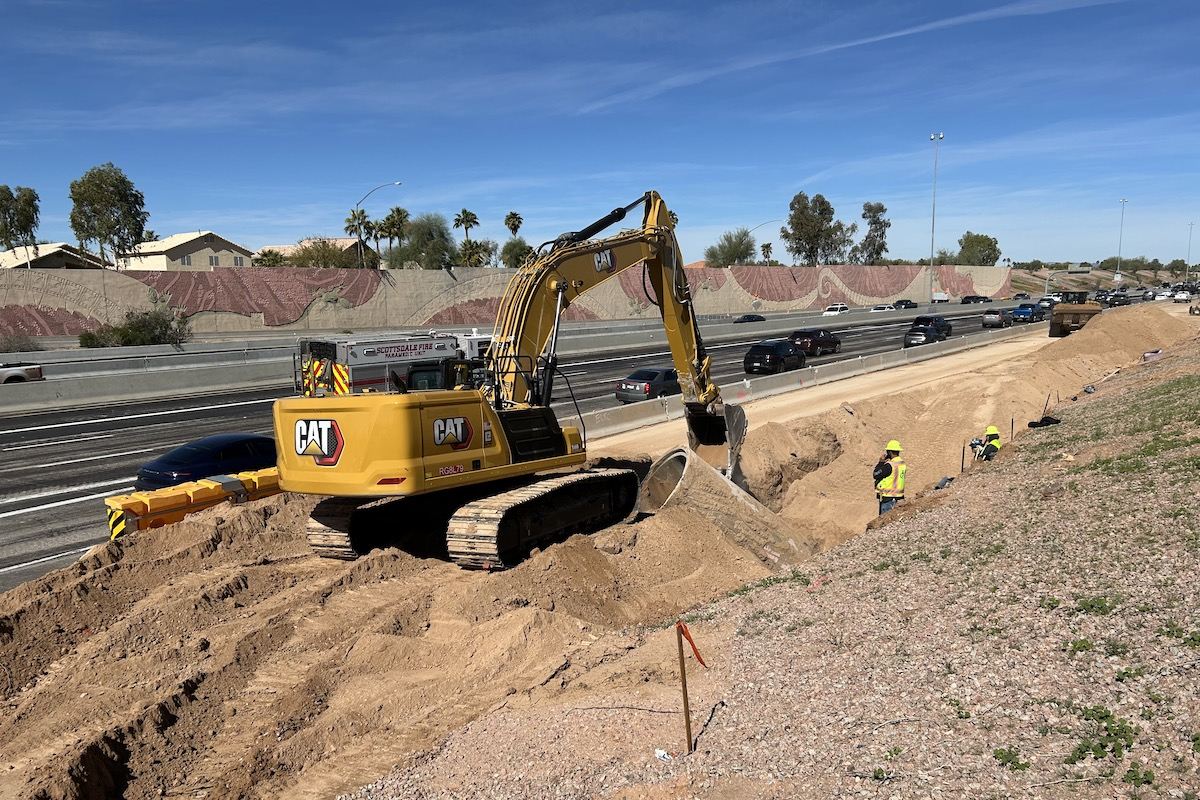 The Loop 101 project in north Scottsdale includes improvements to freeway drainage systems, requiring extensive trenching. (Photo courtesy of ADOT)