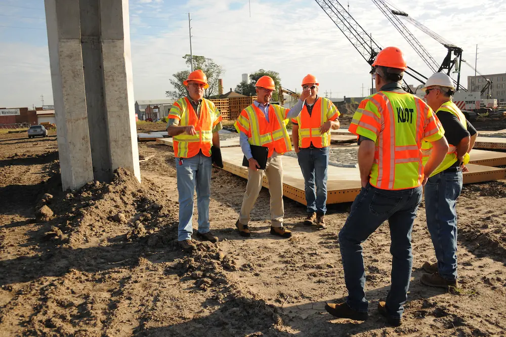 Secretary Calvin Reed (second from left) tours the $239 million Polk-Quincy Viaduct project. Replacing a 60-year-old structure, this major infrastructure investment is slated to open in 2027, with a reduced configuration until all work is completed.