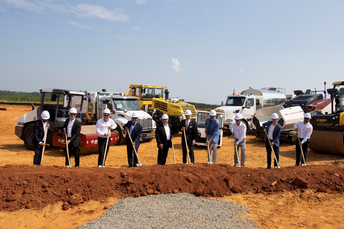 State and local delegates plus FAYAT executives turn first dirt for the new parts distribution center.