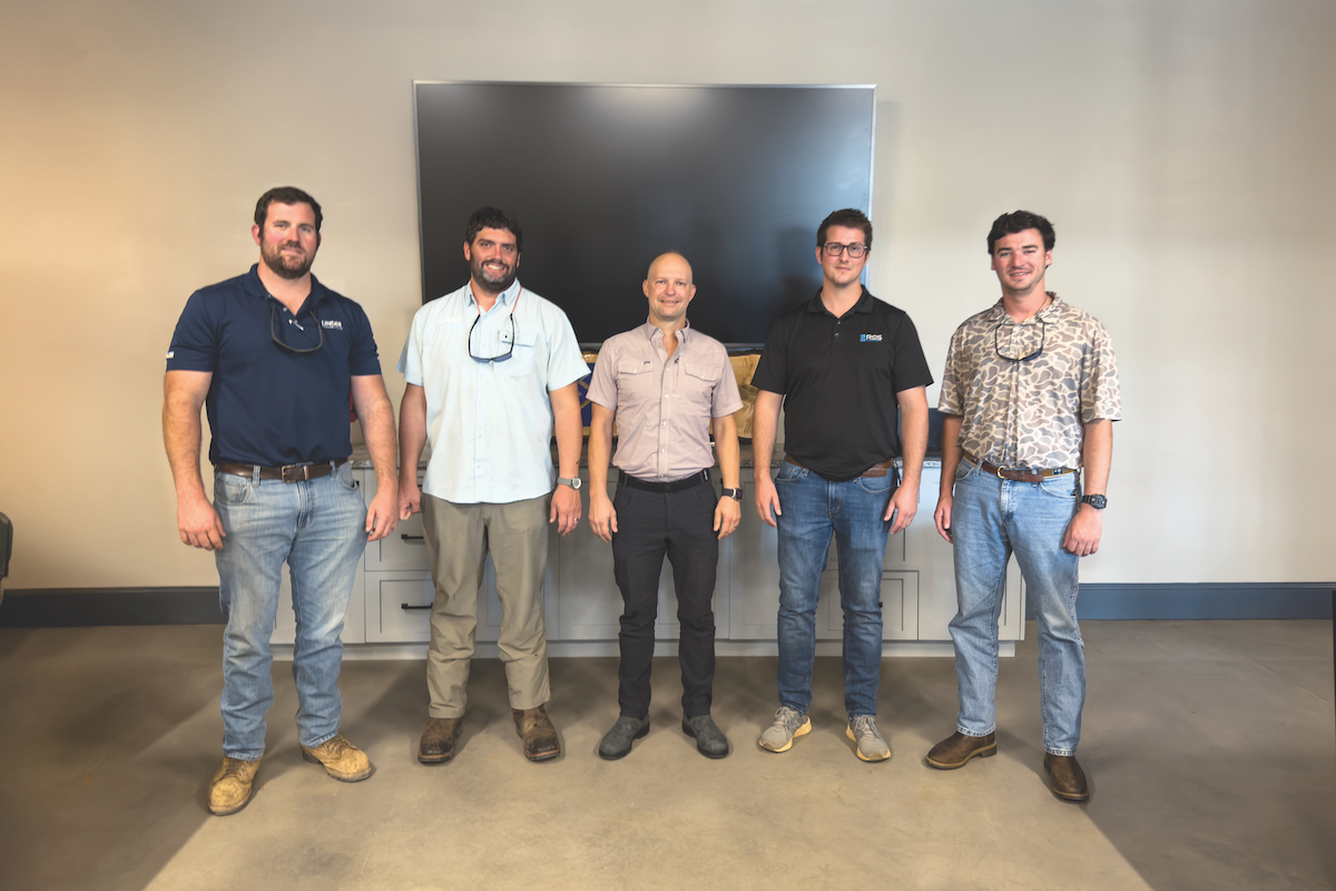 From left to right: Linder’s Zach Nunamacher and Tyler Halbert, RCS’ Elisha Godfrey and Paul Wood, and Linder’s Ryan Dean work together to find equipment and technology solutions for RCS’ operations.