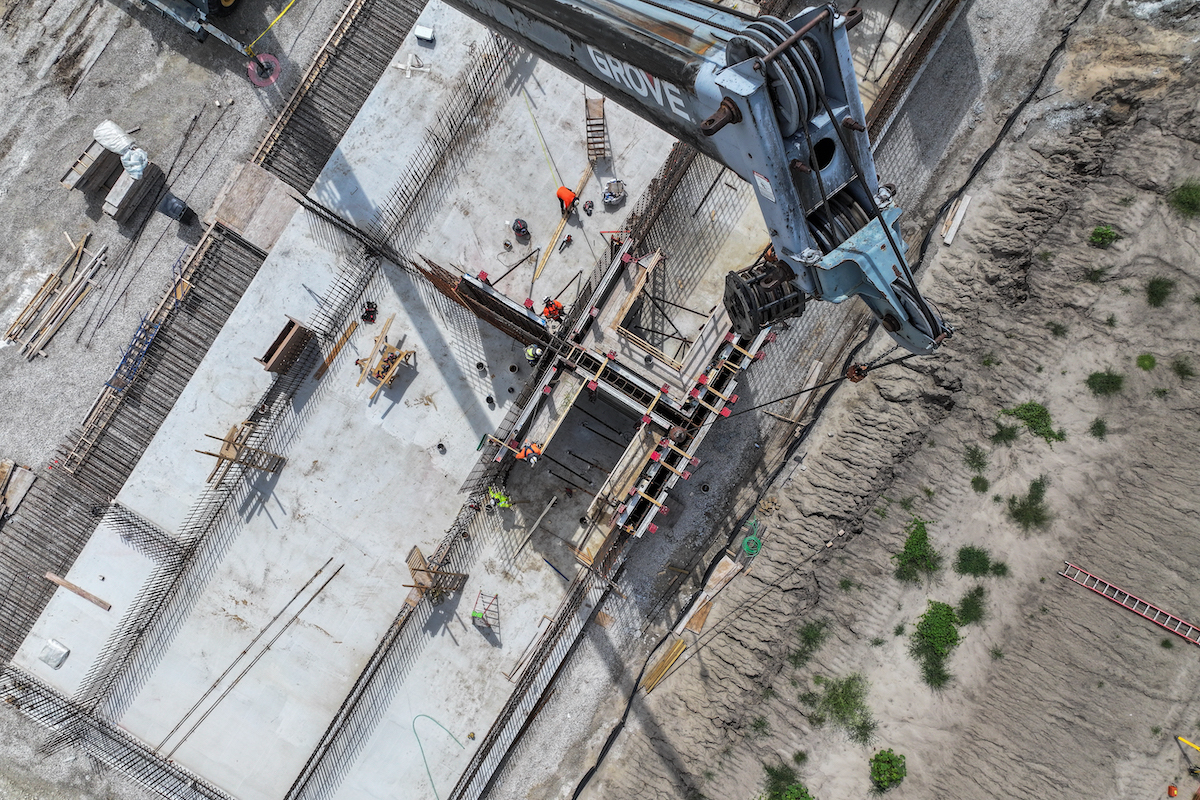 The team forms new concrete walls for the Aeromod Treatment Basin. A total of four slab pours and 36 wall pours are required for this structure.