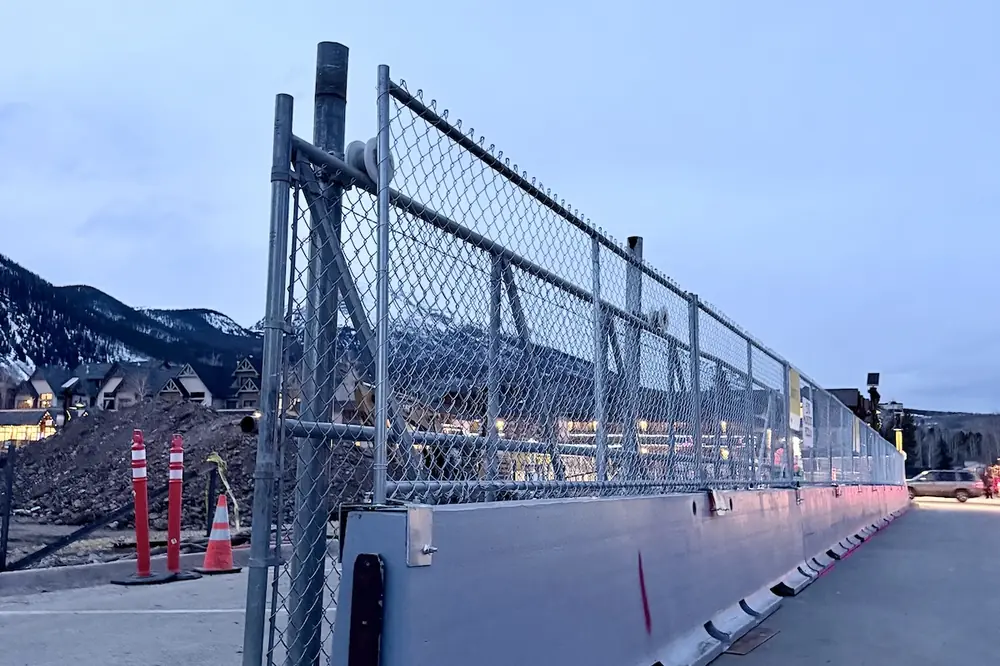 Ape Barrier integrated with temporary fencing to create a secure perimeter.