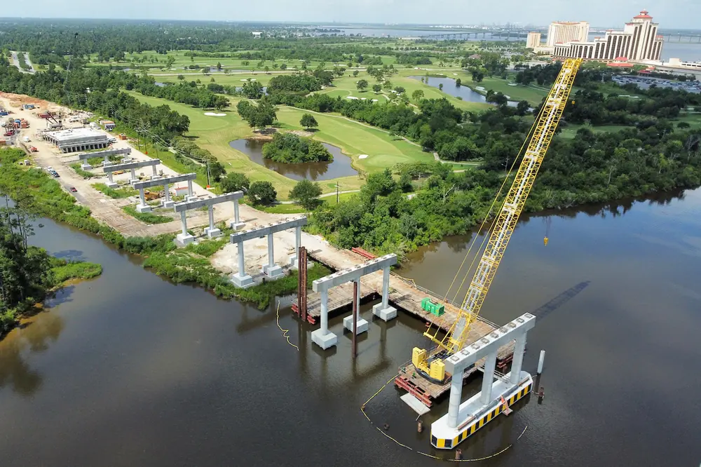 The Nelson Road Extension and Bridge project involves the construction of a prestressed concrete bridge over Contraband Bayou in Calcasieu Parish.
