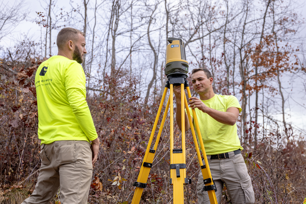 Company Owner Jason Graham (left) and Site Foreman Patrick Ross prepare the Topcon LN in advance of the day’s work.