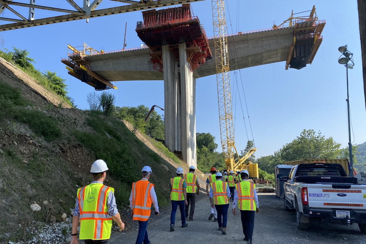 Fay, S&B USA Construction employees lead attendees of the International Bridge Conference on a tour of the Beaver River Bridge total reconstruction and replacement site in Beaver County, Pennsylvania.