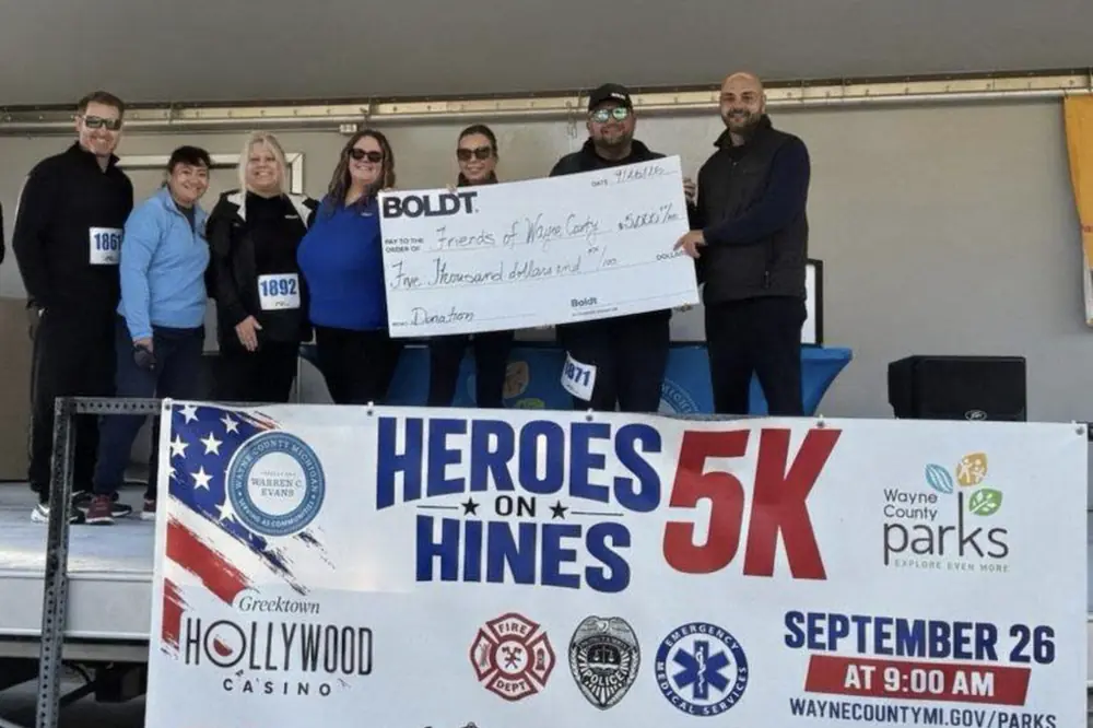 From left to right: Boldt team members Kevin Spiess, Ghia Reinhard, Julie Zajdel, Emily Ellis, Linda Rosati, Michael Webb, and Deputy Wayne County Executive Assad Turfe