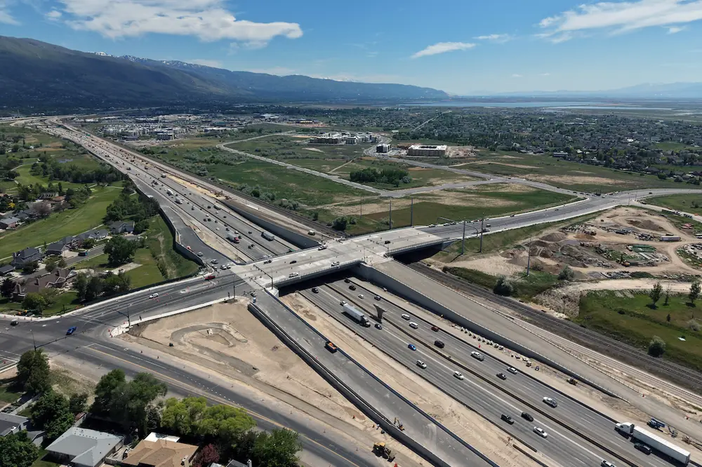 The new bridge and interchange on I-15 will connect local roads across Union Pacific Railroad and Utah Transit Authority tracks.