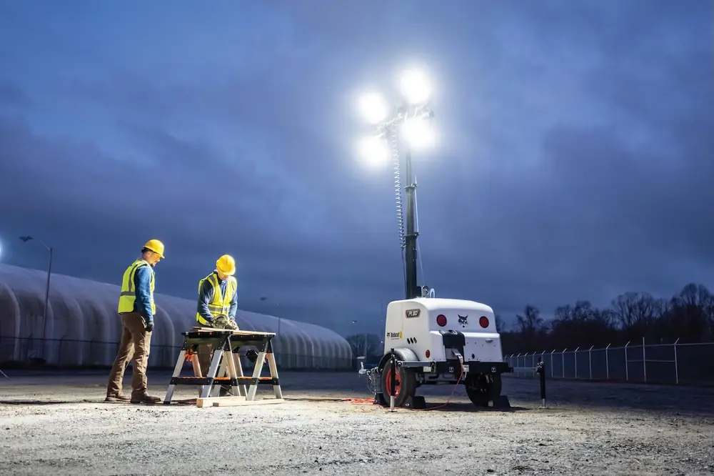 lllumination from light towers enhances safety and quality during extended work hours.