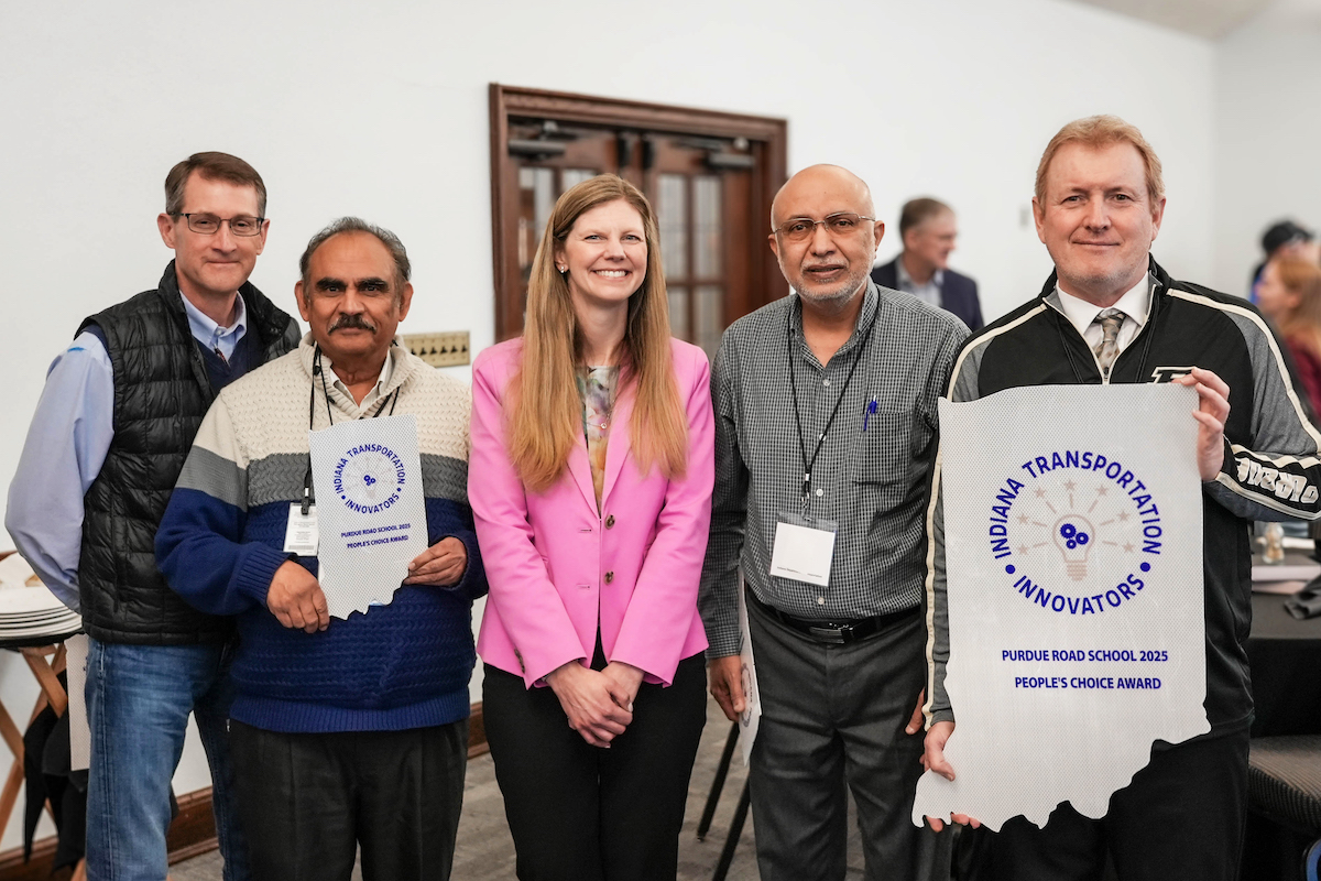 Quist poses for a photo at the 2025 Indiana Transportation Innovators People's Choice Award presentation in March 2025.