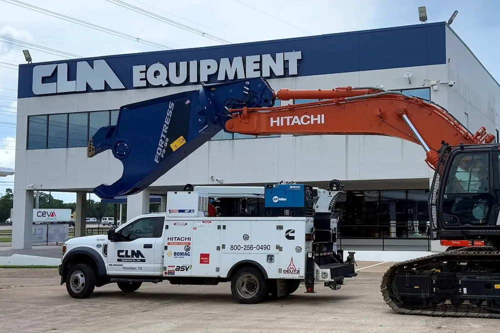 A Hitachi ZX490LC Crawler Excavator equipped with a Fortress shear sits in front of CLM’s Houston branch.