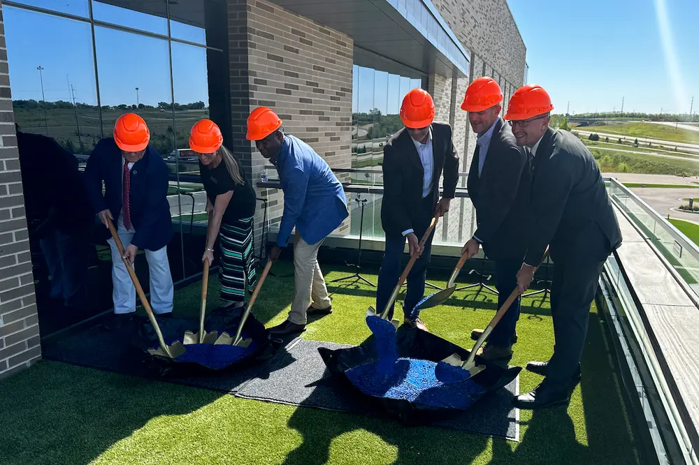 Reed and community leaders break ground on the K-10/South Lawrence Trafficway expansion. This project will widen the west leg to four lanes and modernize multiple interchanges.