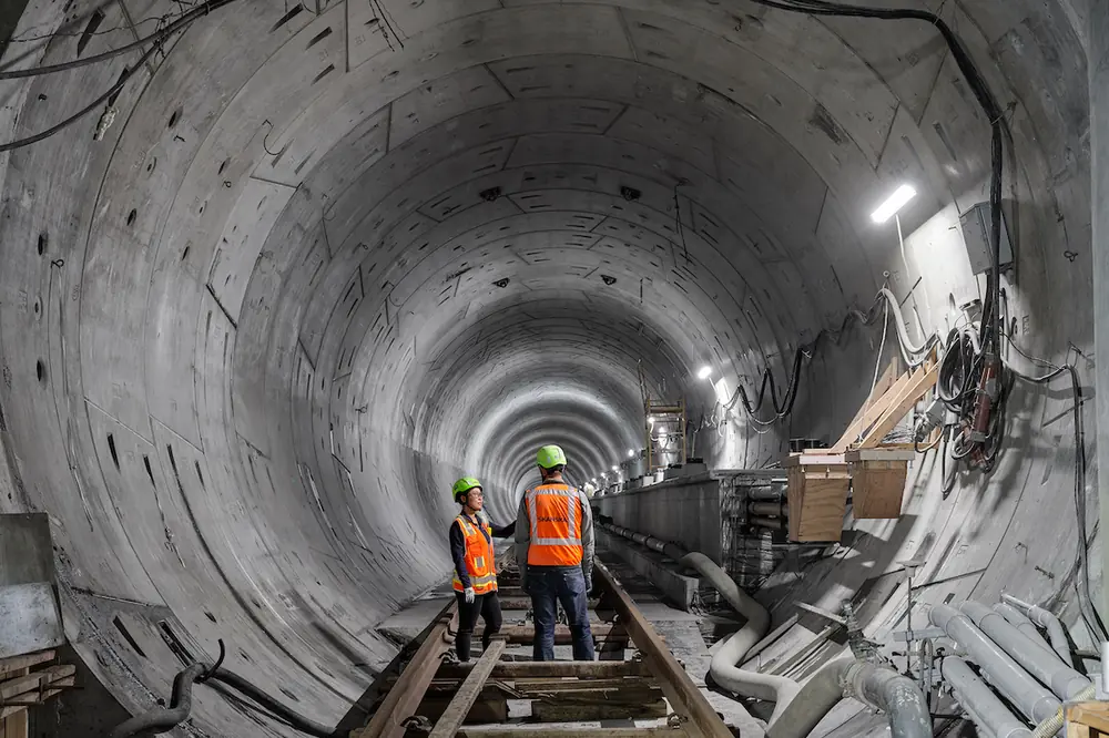 D Line Extension Section 1 extends heavy rail service along Wilshire Boulevard in Los Angeles, with three new underground stations at La Brea, Fairfax, and La Cienega.
