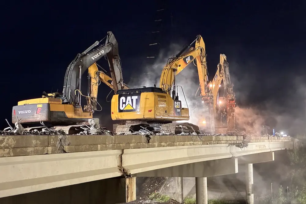 The Highway 218 north/14th Street Northwest bridge is demolished.