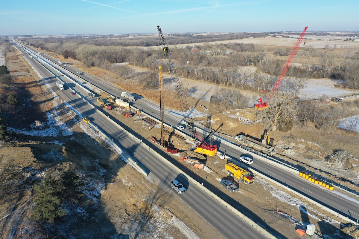 On NDOT’s project along I-80, a crew drives pile for the center pier of the new 112th Street overhead bridge.